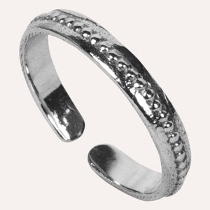 Aesthetically designed 925 sterling silver handmade adjustable ring. It is small, simple, delicate, elegant, light weight. Suitable for all occasions. Rhodium plating makes it less prone to tarnish. Completely hypoallergenic, allergy-free, nickel-free jewellery. Use as finger ring, above-knuckle ring, thumb band, stacking rings, stopper ring, mid finger ring or toe ring.  Ideal Christmas gift all age groups - teenage girls to mature ladies. Unique ring beautifully packaged in jewellery bag & box. 