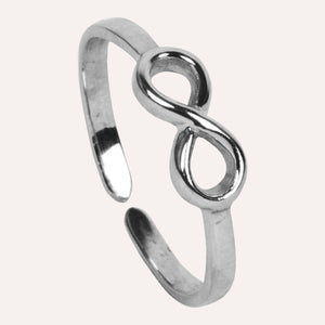 Aesthetically designed 925 sterling silver handmade adjustable ring. It is small, simple, delicate, elegant, light weight. Suitable for all occasions. Rhodium plating makes it less prone to tarnish. Completely hypoallergenic, allergy-free, nickel-free jewellery. Use as finger ring, above-knuckle ring, thumb band, stacking rings, stopper ring, mid finger ring or toe ring.  Ideal Christmas gift all age groups - teenage girls to mature ladies. Unique ring beautifully packaged in jewellery bag & box. 